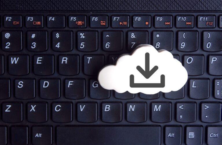 White cloud with download icon on keyboard